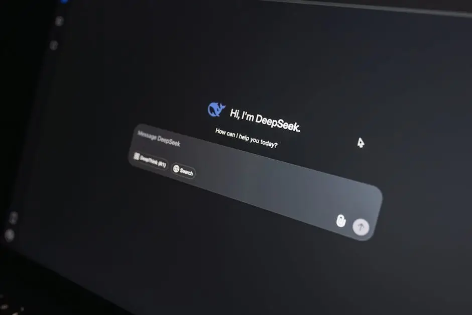 Close-up of DeepSeek AI chat interface on a laptop screen in low light.