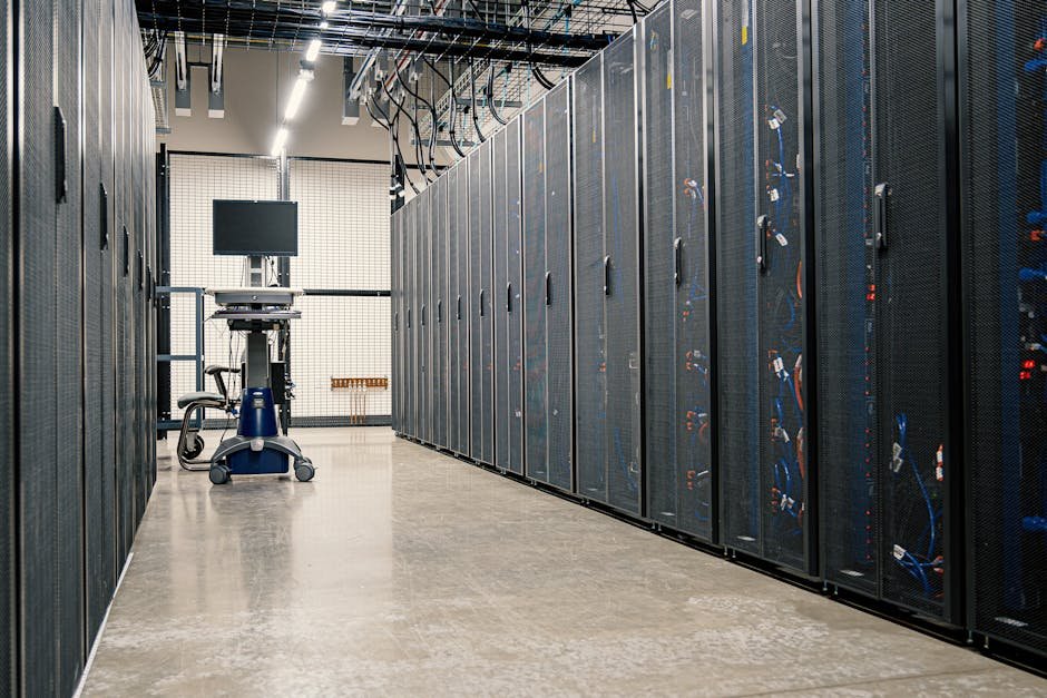 Steel framework cabinets housing servers networking devices and cables in contemporary equipped data center