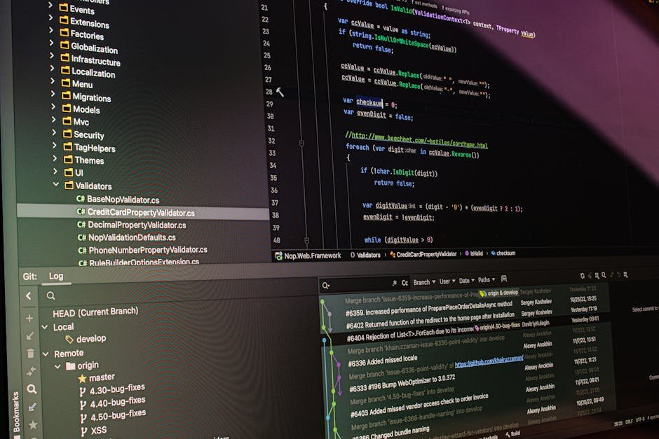 Close-up of software development tools displaying code and version control systems on a computer monitor.