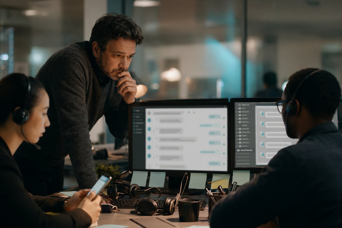 Operations team monitoring dashboards while AI agent management slows customer service support