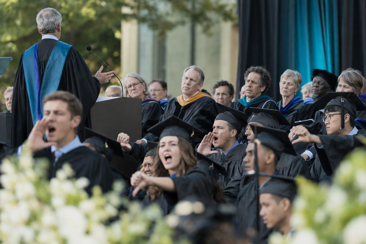 Graduates reacting at commencement highlight AI reputation in industry concerns among young professionals