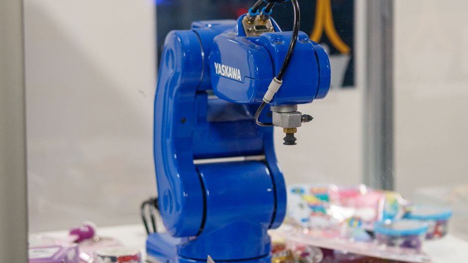 AI automation in manufacturing streamlines processes by applying VENOM program principles to reduce manual tasks and boost efficiency