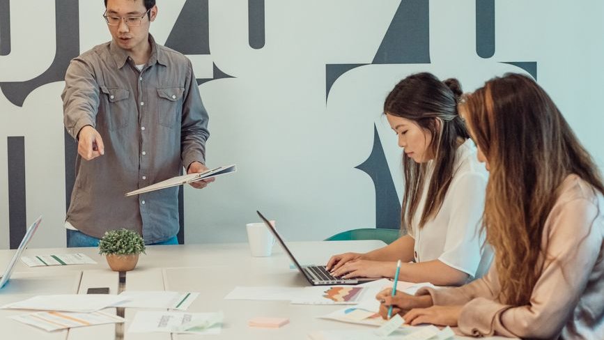 A team reviewing LinkedIn posts to detect and address AI-generated content in professional networks