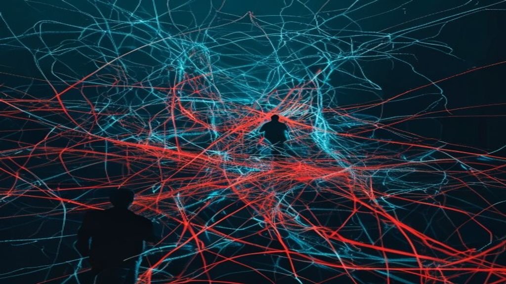 A chaotic scene of people frantically using glowing AI screens as data and decisions spiral out of control in a dimly lit room
