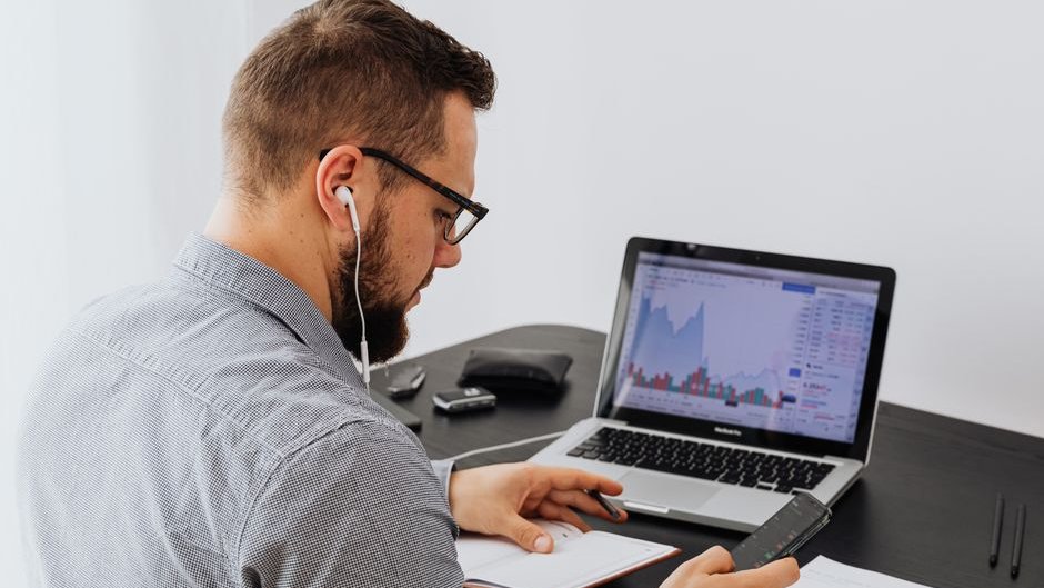 A team using AI tools to track time savings and measure productivity gains in a business setting