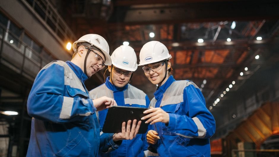 Factory leaders analyze a digital dashboard displaying AI revenue concentration across operational workflows