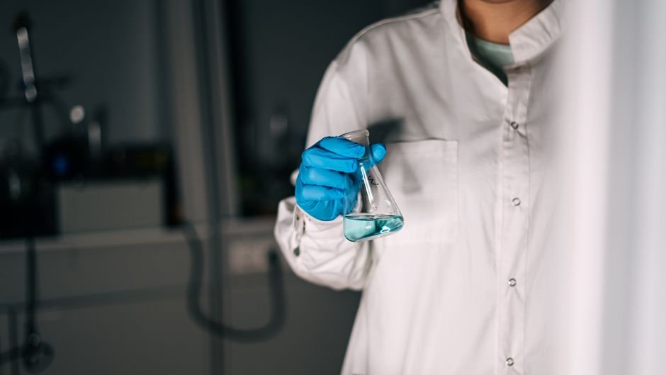 A robotic lab arm synthesizes new chemical compounds generated during AI material discovery