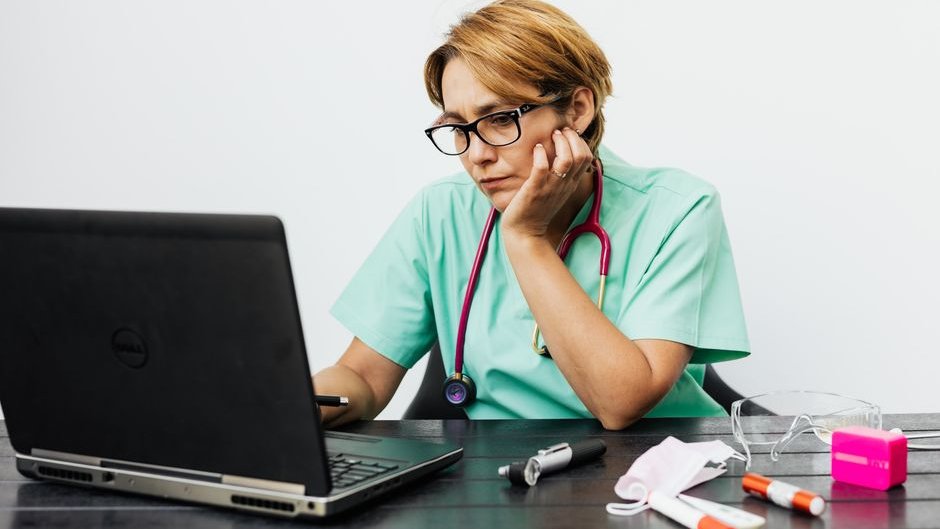 A computer screen displaying fake medical researcher profiles exposes AI vendor deception
