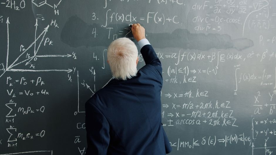 Glowing digital code overlays complex handwritten chalkboard formulas used in AI mathematical reasoning